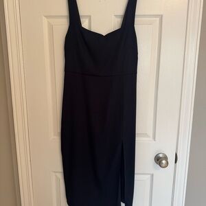 Babaton Black Sleeveless Midi Dress with Side Slit